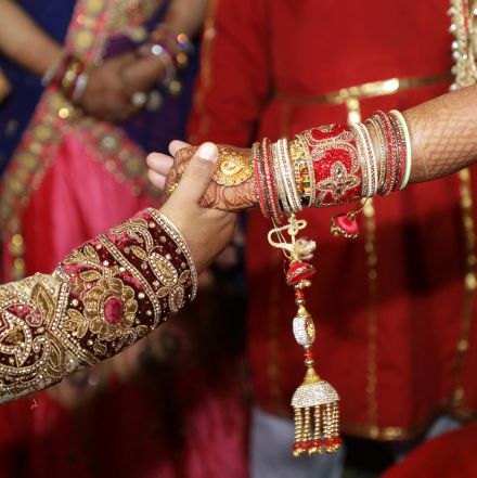 Close-up of a vibrant Indian wedding ceremony showcasing traditional attire and jewelry in Jaipur.